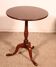 Small guéridon called tea table in mahogany from the early 19th century.