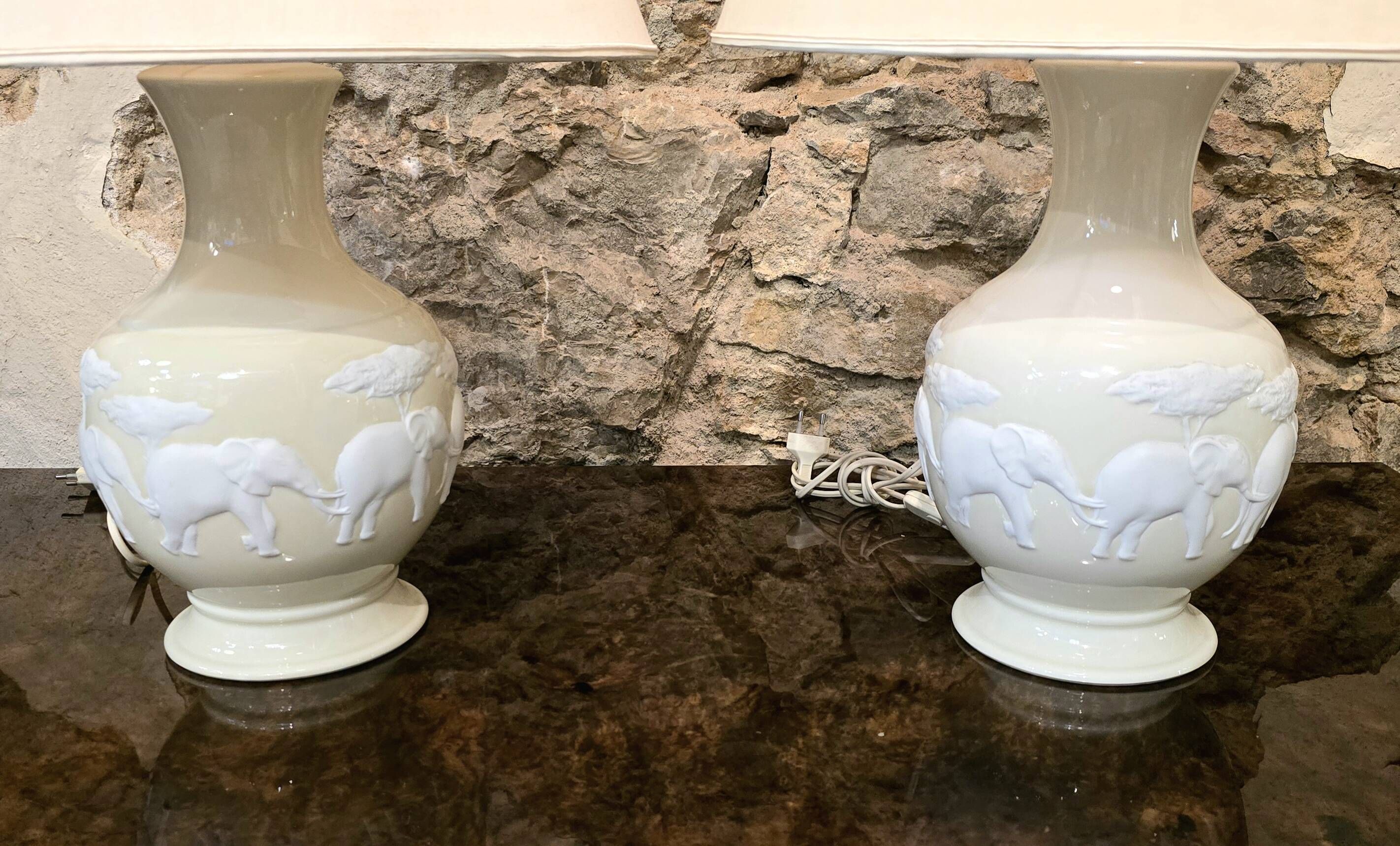 Pair of Raynaud Limoges lamps – Kenya model – Biscuit elephants – 20th century