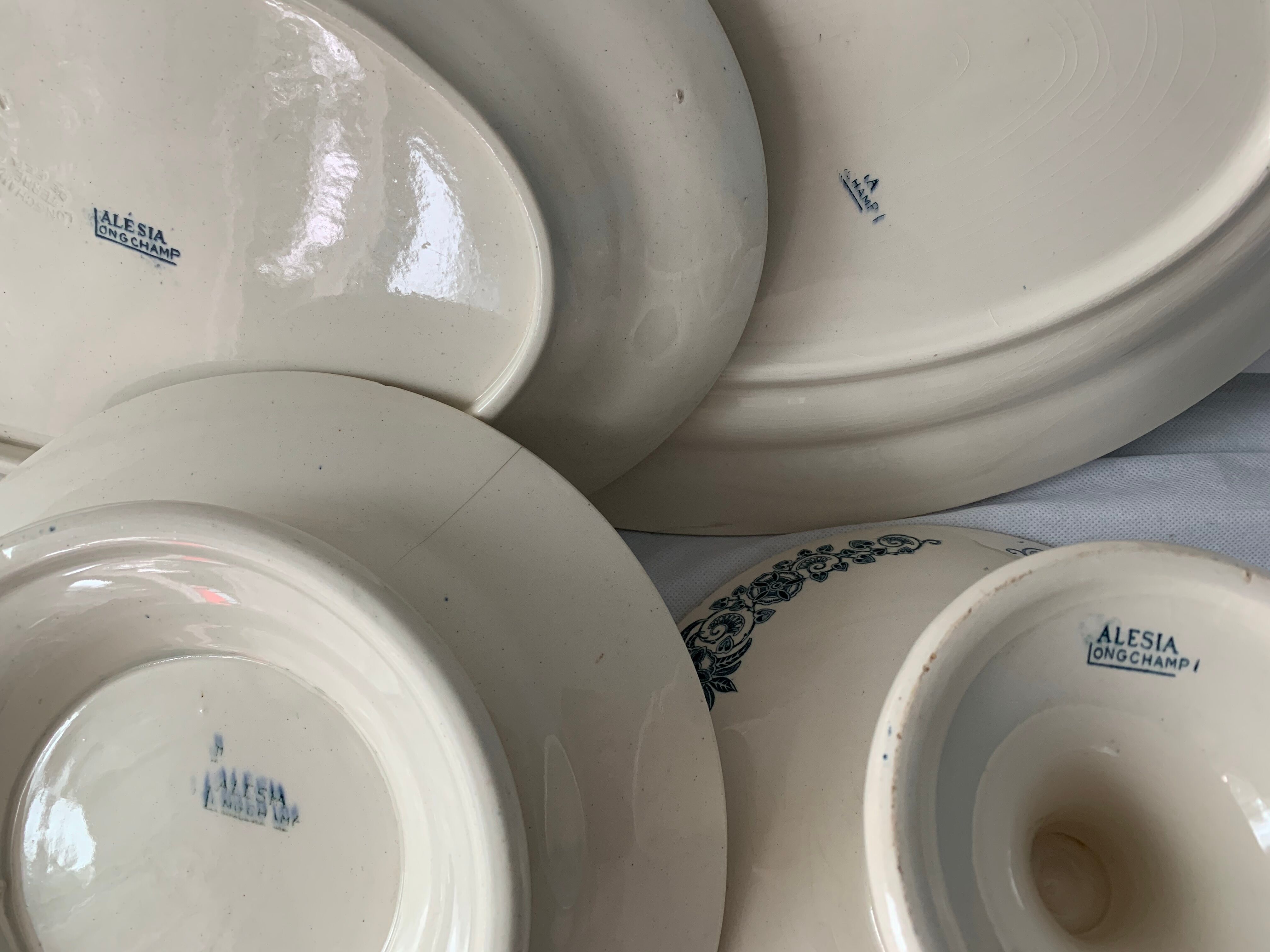 4 blue and white service dishes Alesia Longchamp Iron Land early 20th century