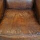 Sheepskin wingback chair in good condition
