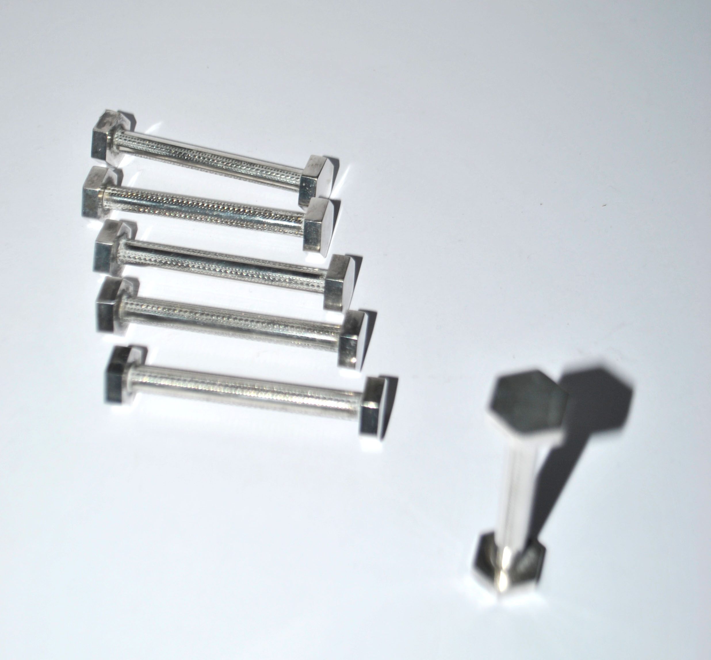 Set of 6 modernist industrial design silver metal nut and bolt knife rests