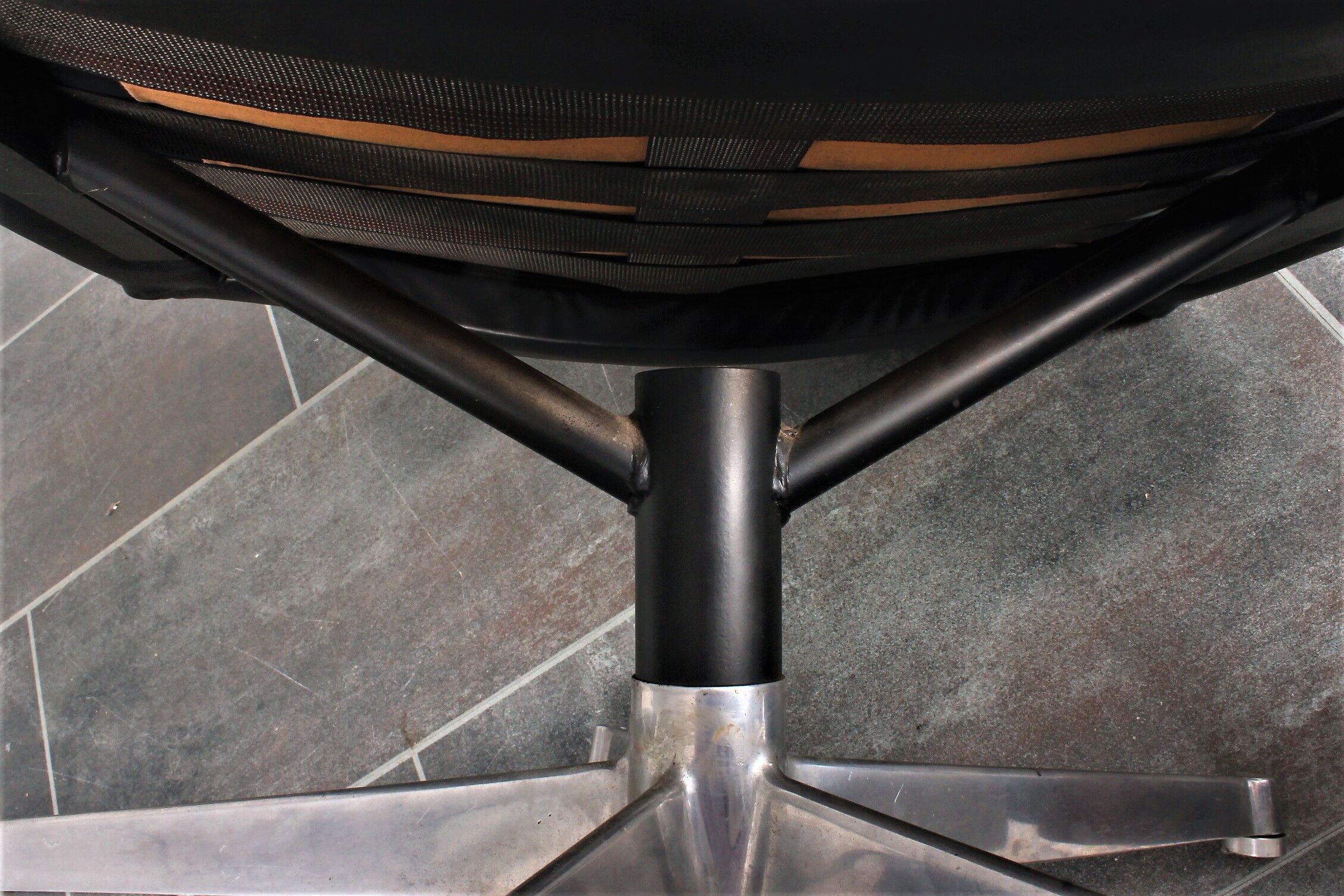 Armchair and footstool by André Vandenbeuck for Strässle in black leather