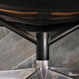 Armchair and footstool by André Vandenbeuck for Strässle in black leather