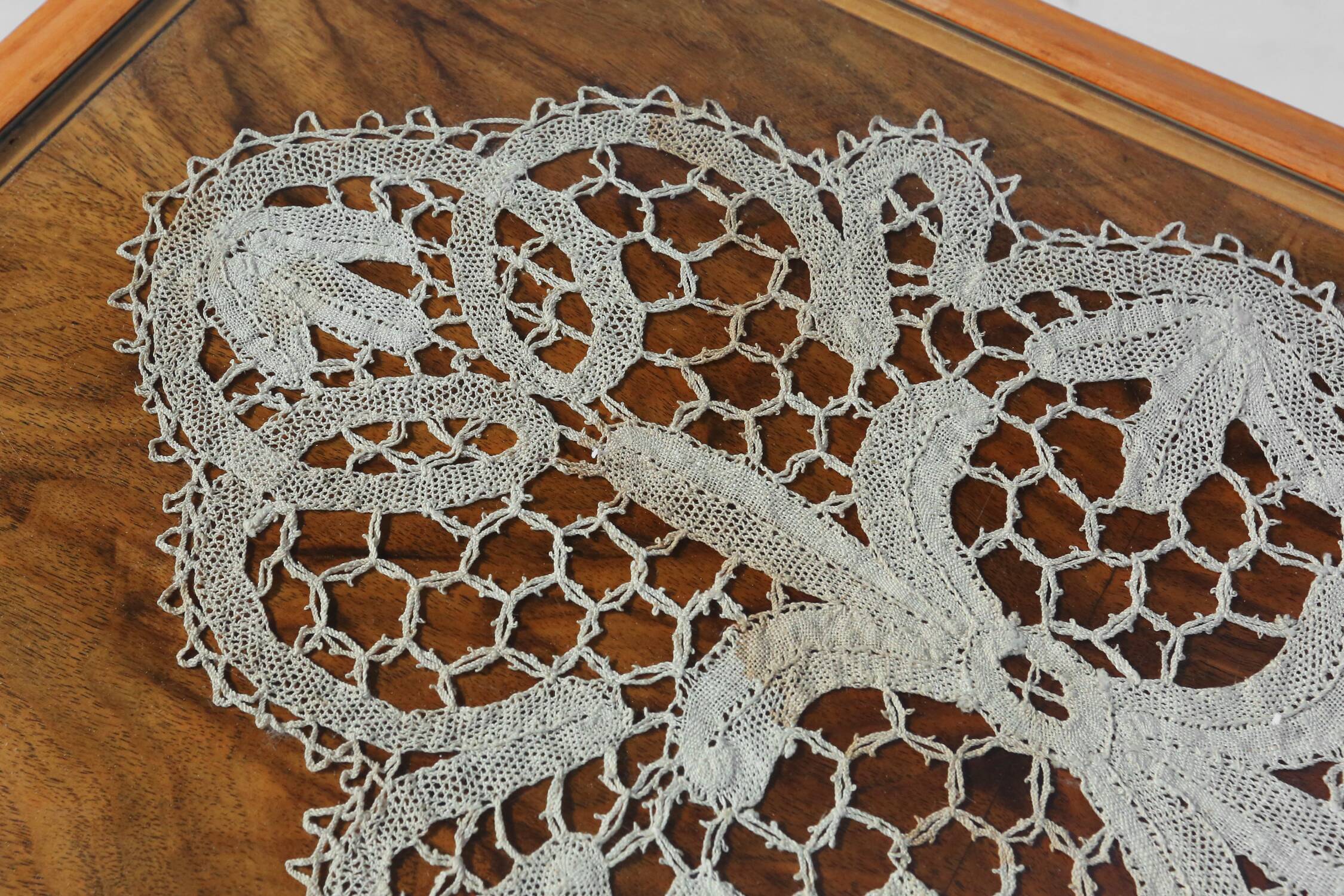 Elegant French side table in beech wood with lace inlay and glass top, 1950s