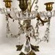 Pair of candlesticks with tassels and flowers in white porcelain
