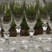 Set of 6 antique crystal champagne flutes. Engraved frieze.