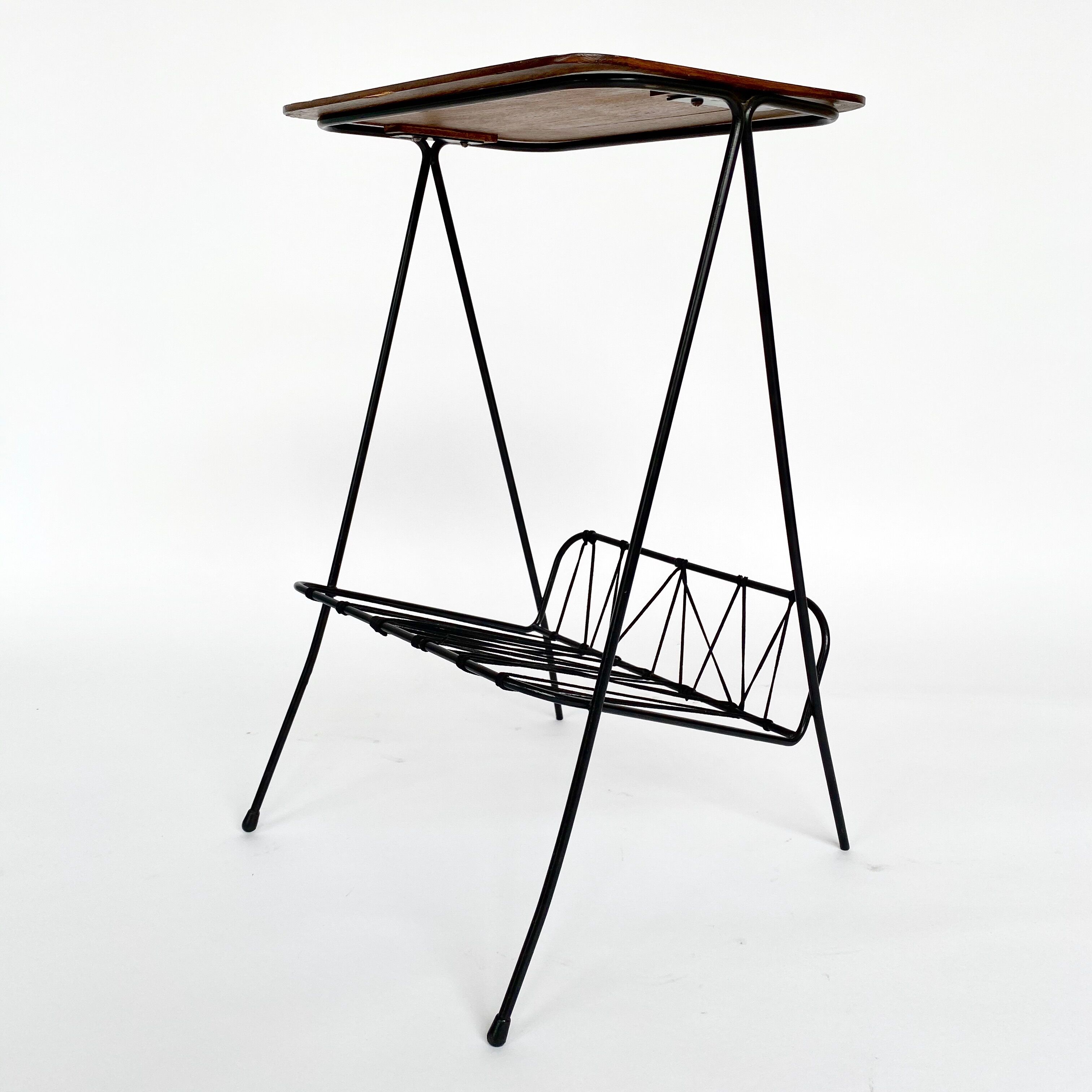 Side table with vintage metal and wood magazine holder