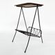 Side table with vintage metal and wood magazine holder