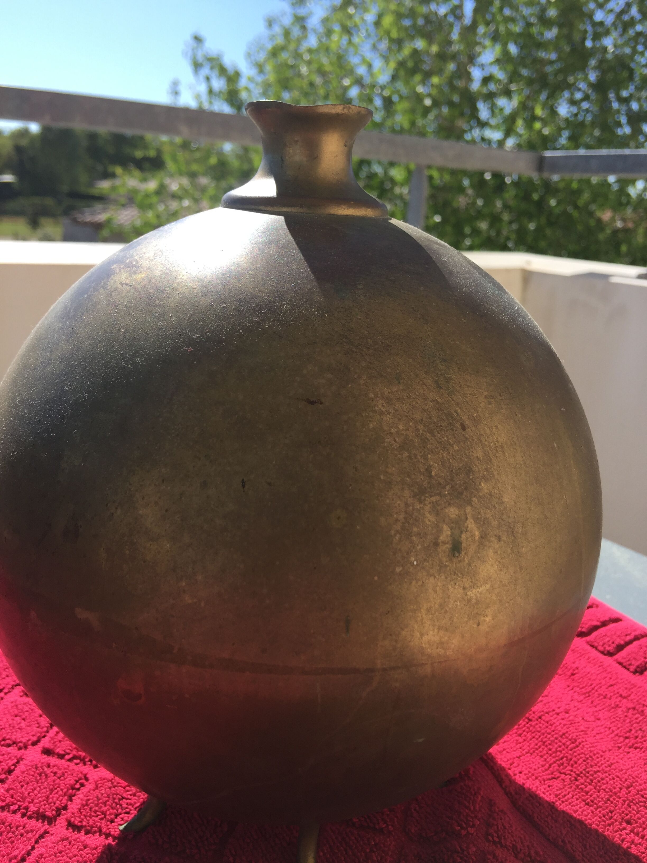 Ancient copper vase soliflore on foot