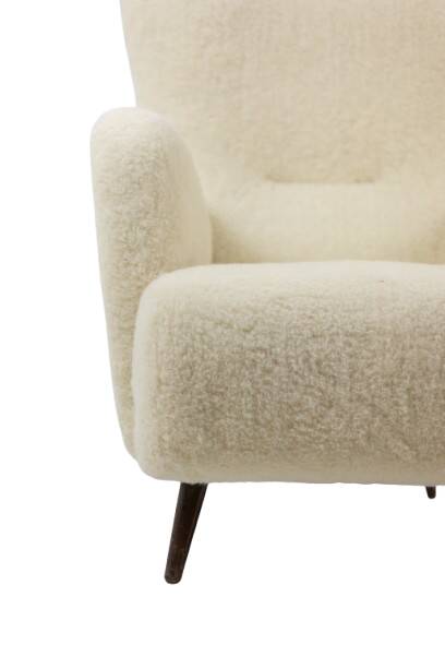 Armchair, or bergère, with its boucle fabric. 1950s