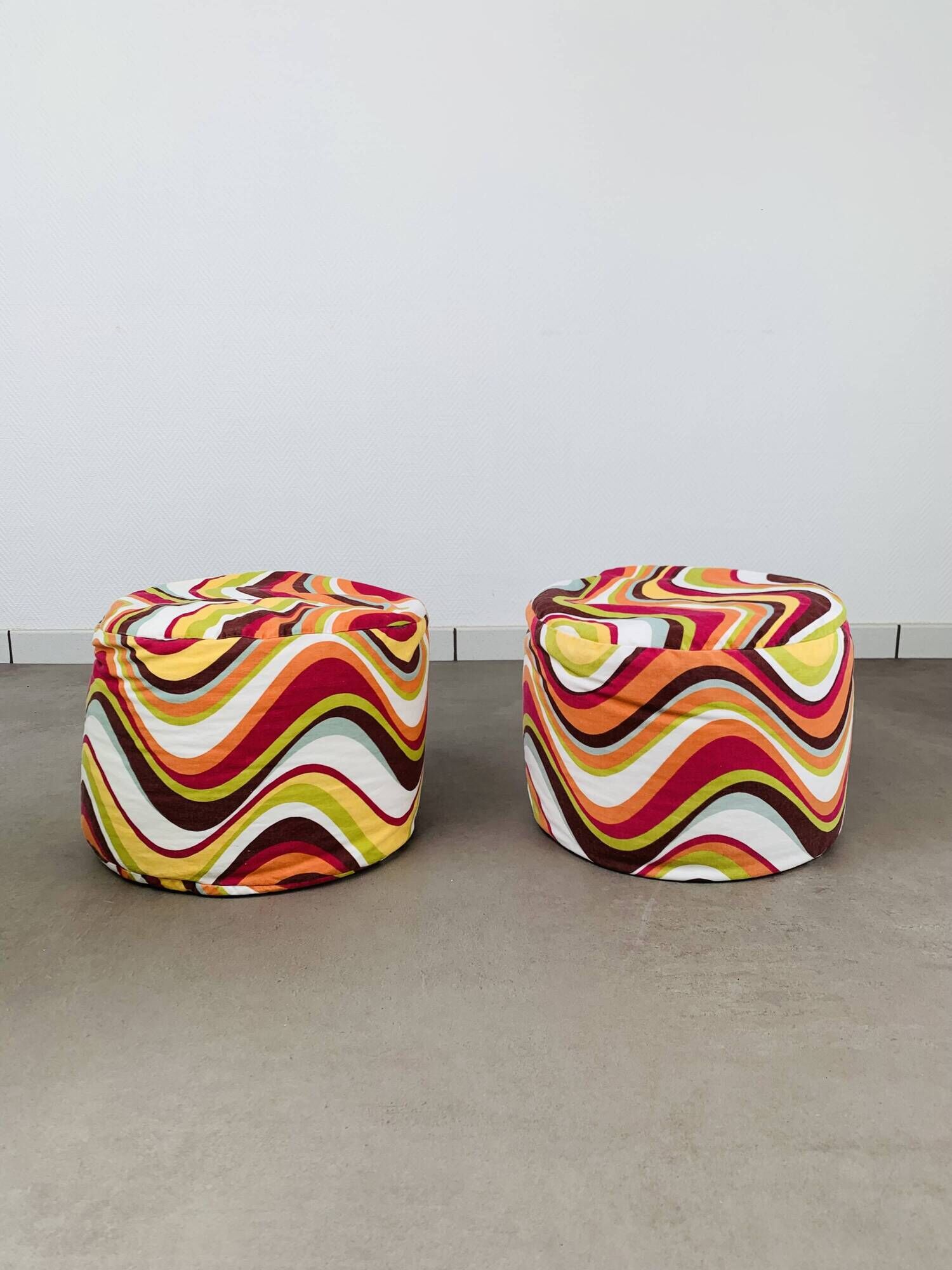 Pair of "psychedelic" fabric poufs from the 70s.