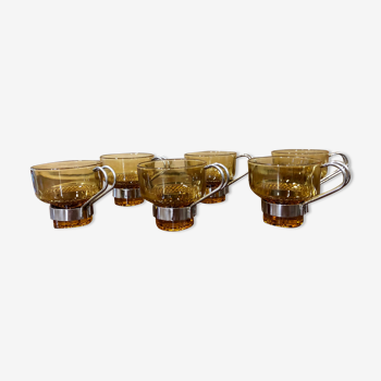 Amber glass and metal cups