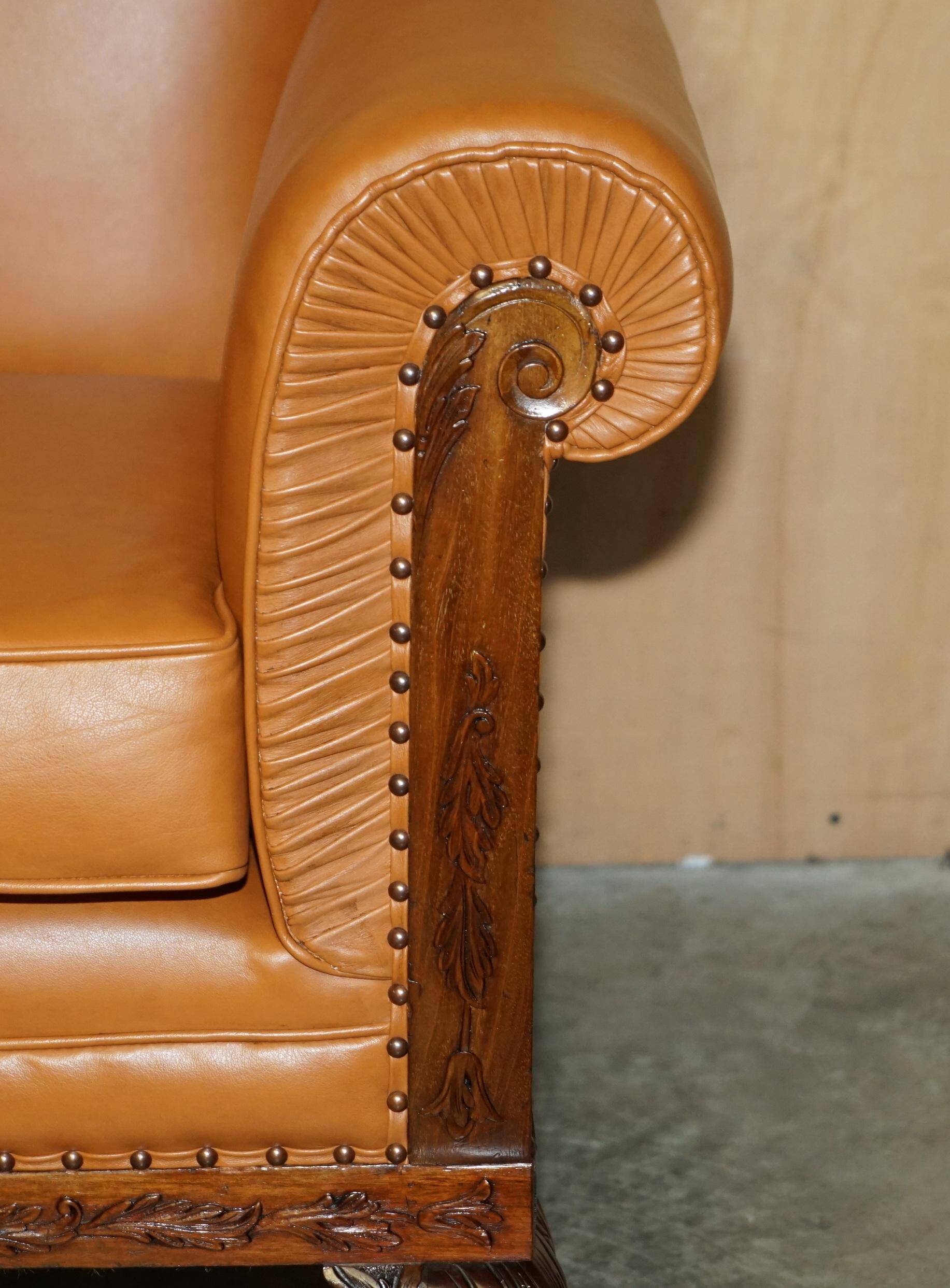 Restored three-seater leather canapé in late Victorian style.