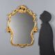 Carved and gilded wooden mirror in Barocchetto style