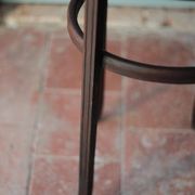 Wooden drawer table or 19th-century work table with a curved wooden stretcher, in the style of Thonet, circa 1900-1920.