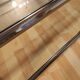 Hollywood regency gold metal & smoked silver coffee table, cut glass