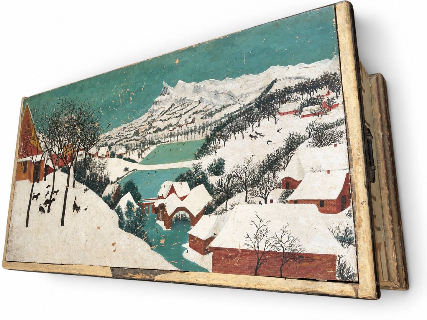 Antique chest hand-painted with a snowy village scene and a starry interior.