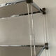 Vintage shelf in lucite, brass, and smoked glass from the 1970s.
