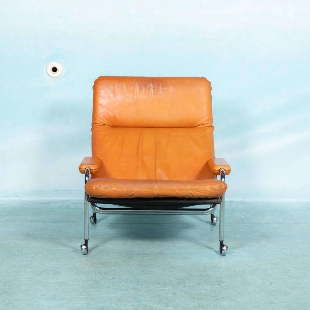 60s cognac leather designer armchair, mid-century modern leather lounge chair.