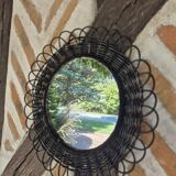 Vintage black rattan flower mirror