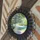 Vintage black rattan flower mirror