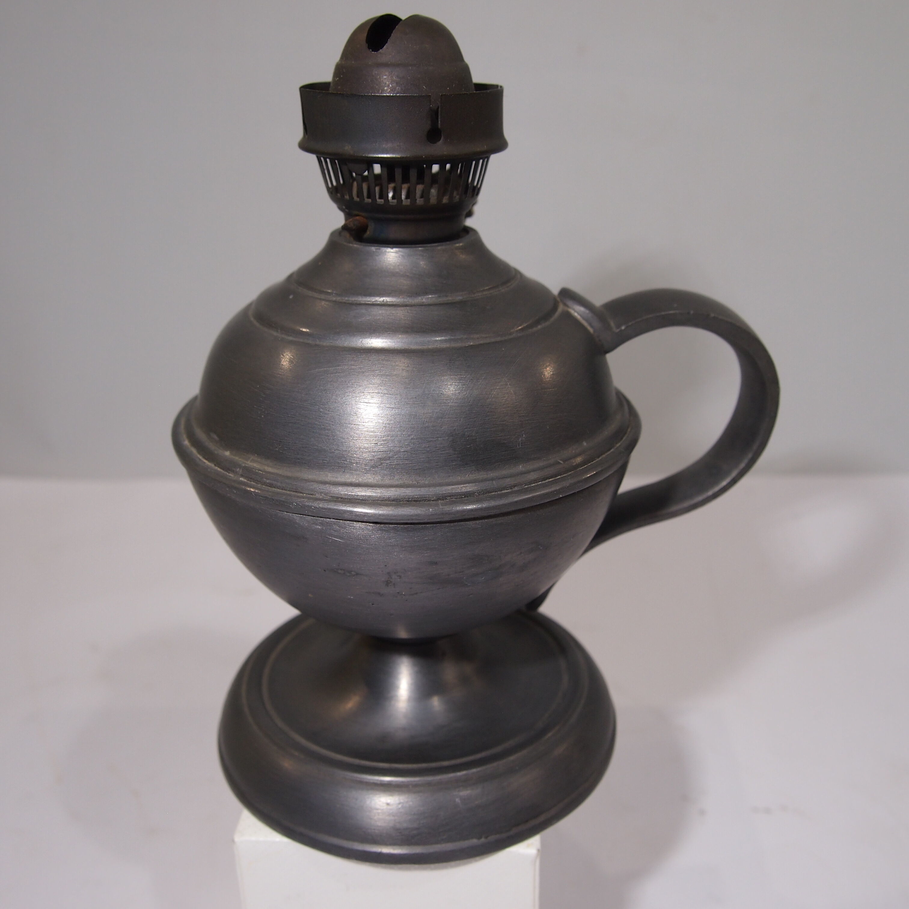 Vintage pewter oil lamp
