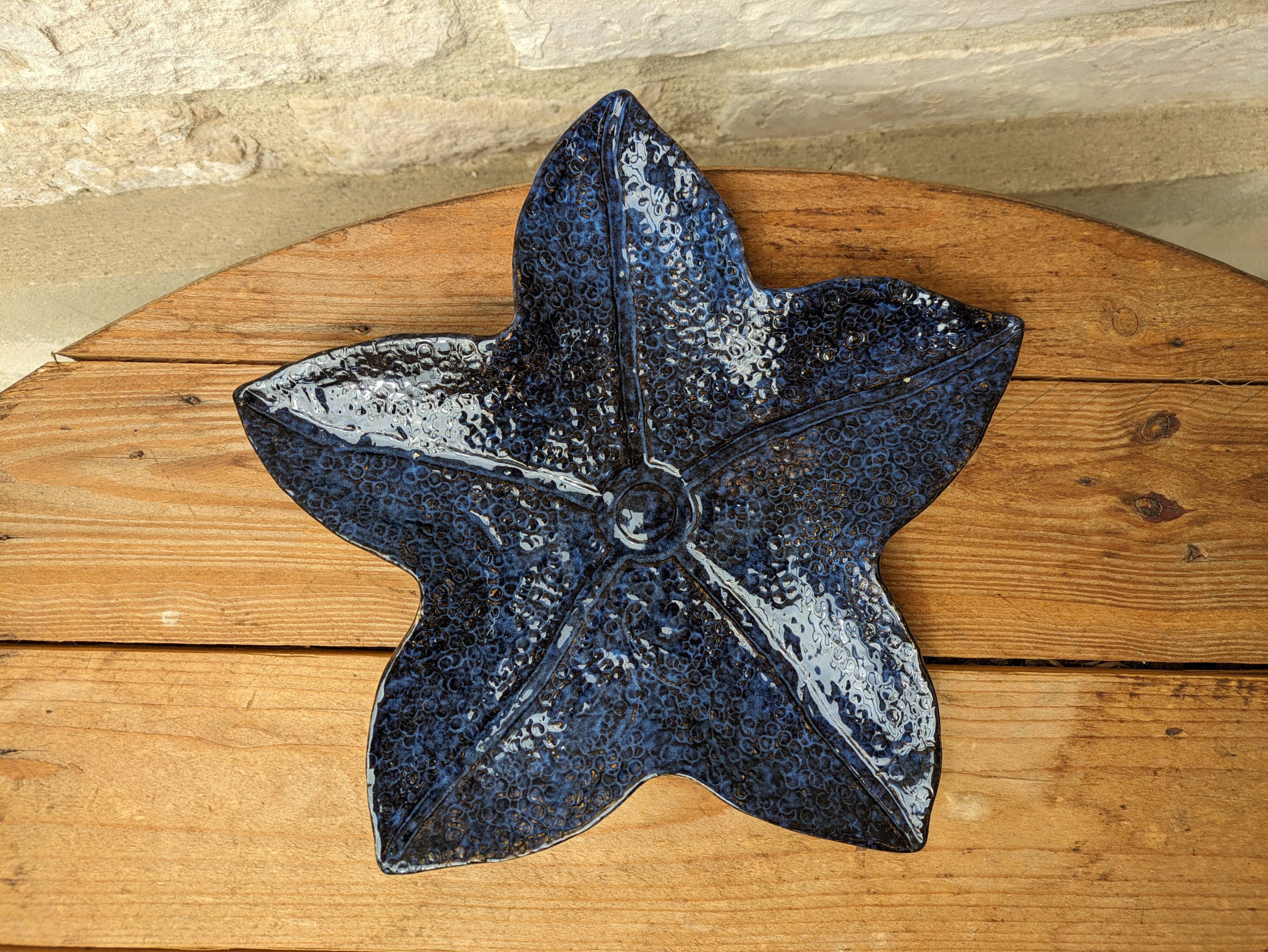 Blue ceramic starfish shaped flat plate