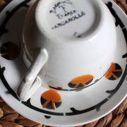 A large cup of chocolate tea, saucer Badonviller Barcarolle orange black.