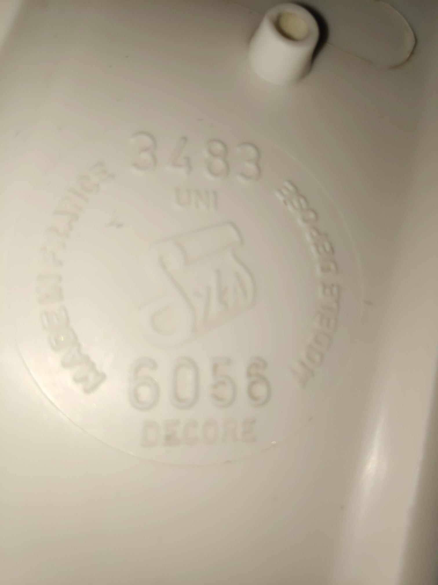 Vintage white plastic coat rack