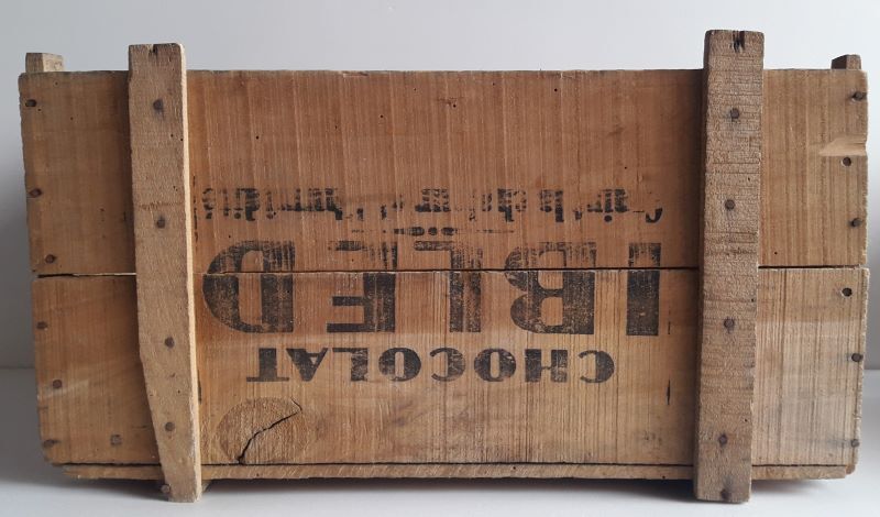 Ibled chocolate box in old wooden transport