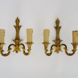 Old pair of wall sconces with double fires in bronze, seventies