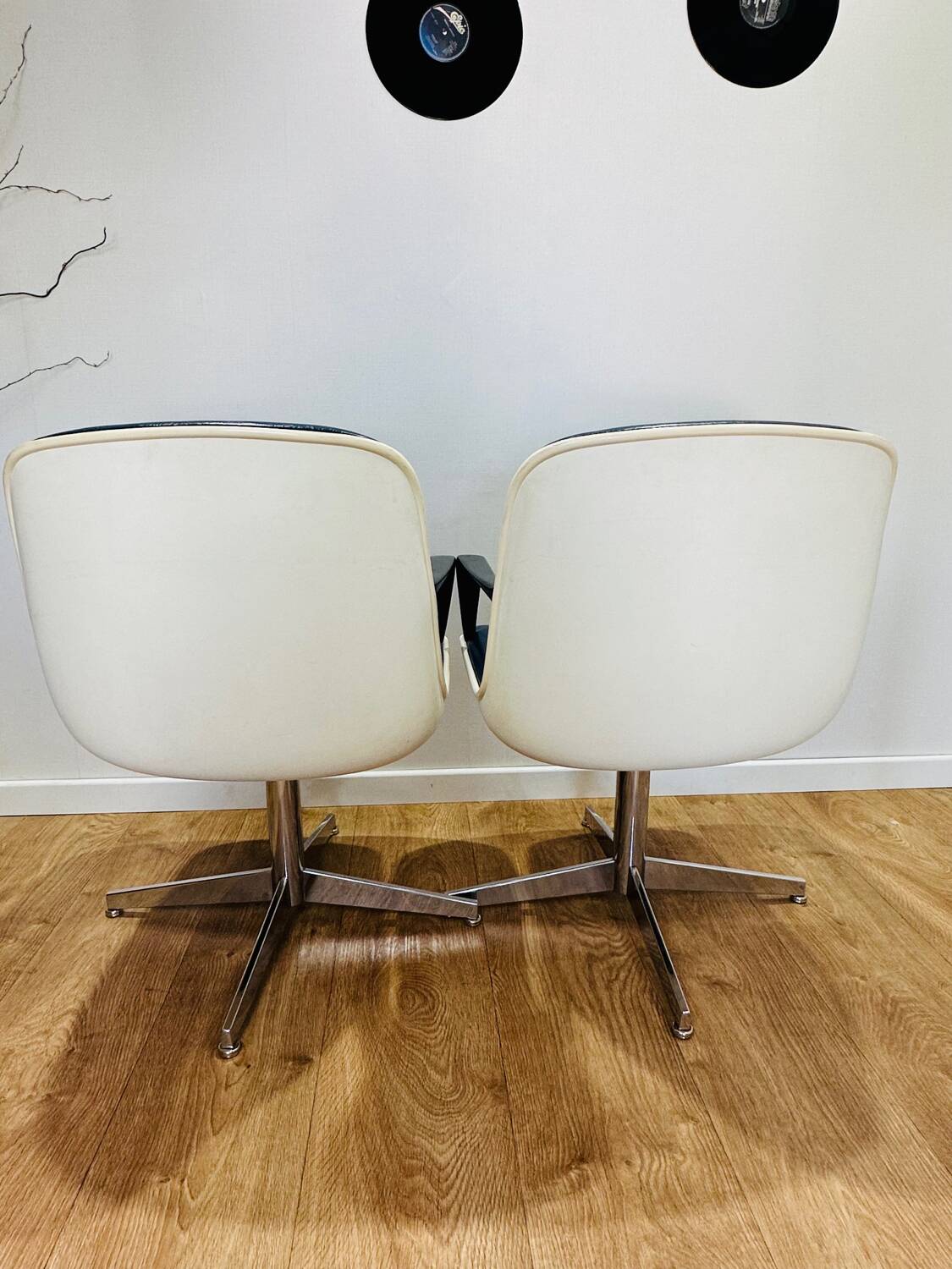 2 office chairs attr. to Strafor, white molded plastic shell, blue skai and chrome metal star base