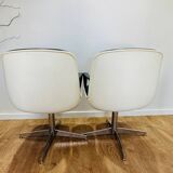 2 office chairs attr. to Strafor, white molded plastic shell, blue skai and chrome metal star base