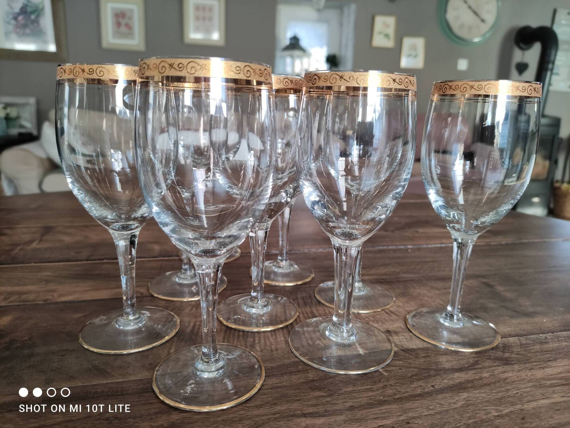 Set of 9 water or red wine glasses in crystal curled and gilded edging