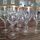 Set of 9 water or red wine glasses in crystal curled and gilded edging