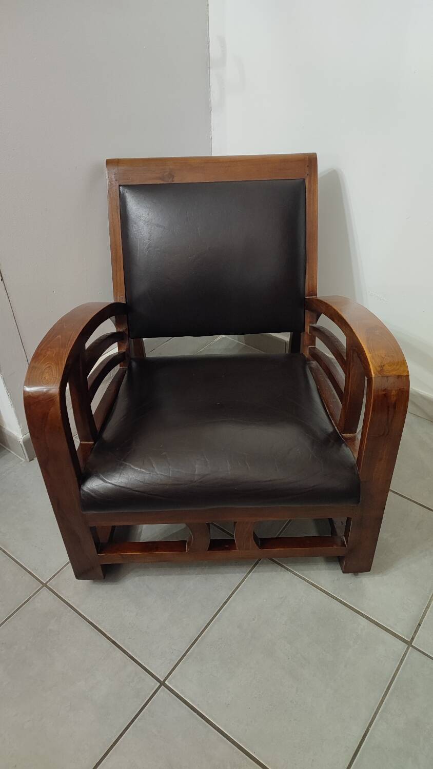Leather and teak armchair