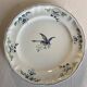 Plat de service rond en faïence Longchamp 1930