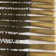 Set of 11 old table knives, horn handle, stainless blade and silver ferrule