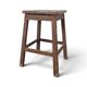 Brown painted wooden workshop stool with a patinated top.