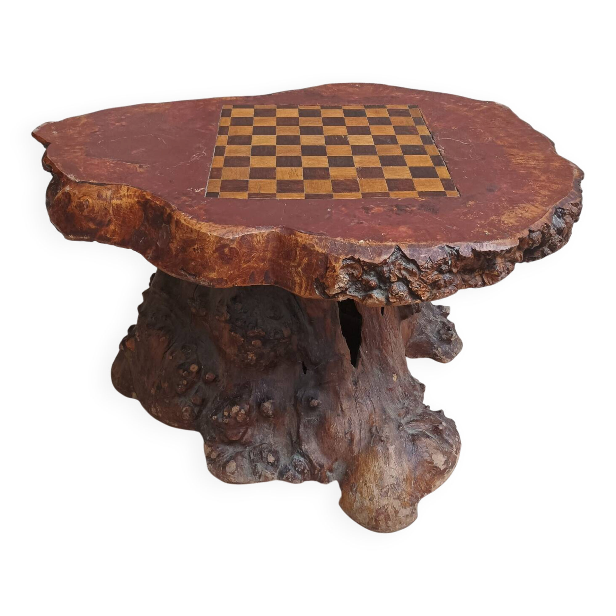 Brutalist chessboard coffee table made from tree stump.