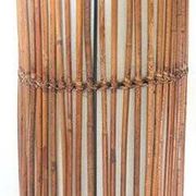 Mid-century rattan floor lamp, in the style of Louis Sognot.