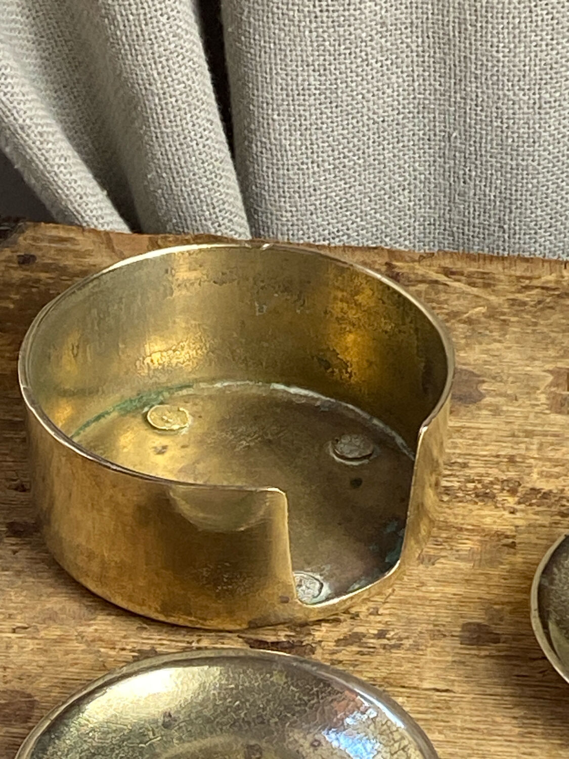 Individual brass ashtrays with storage support