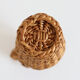 Bottle dressed in wicker