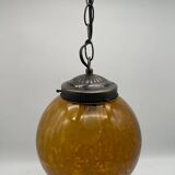 Vintage globe pendant light in amber Clichy glass