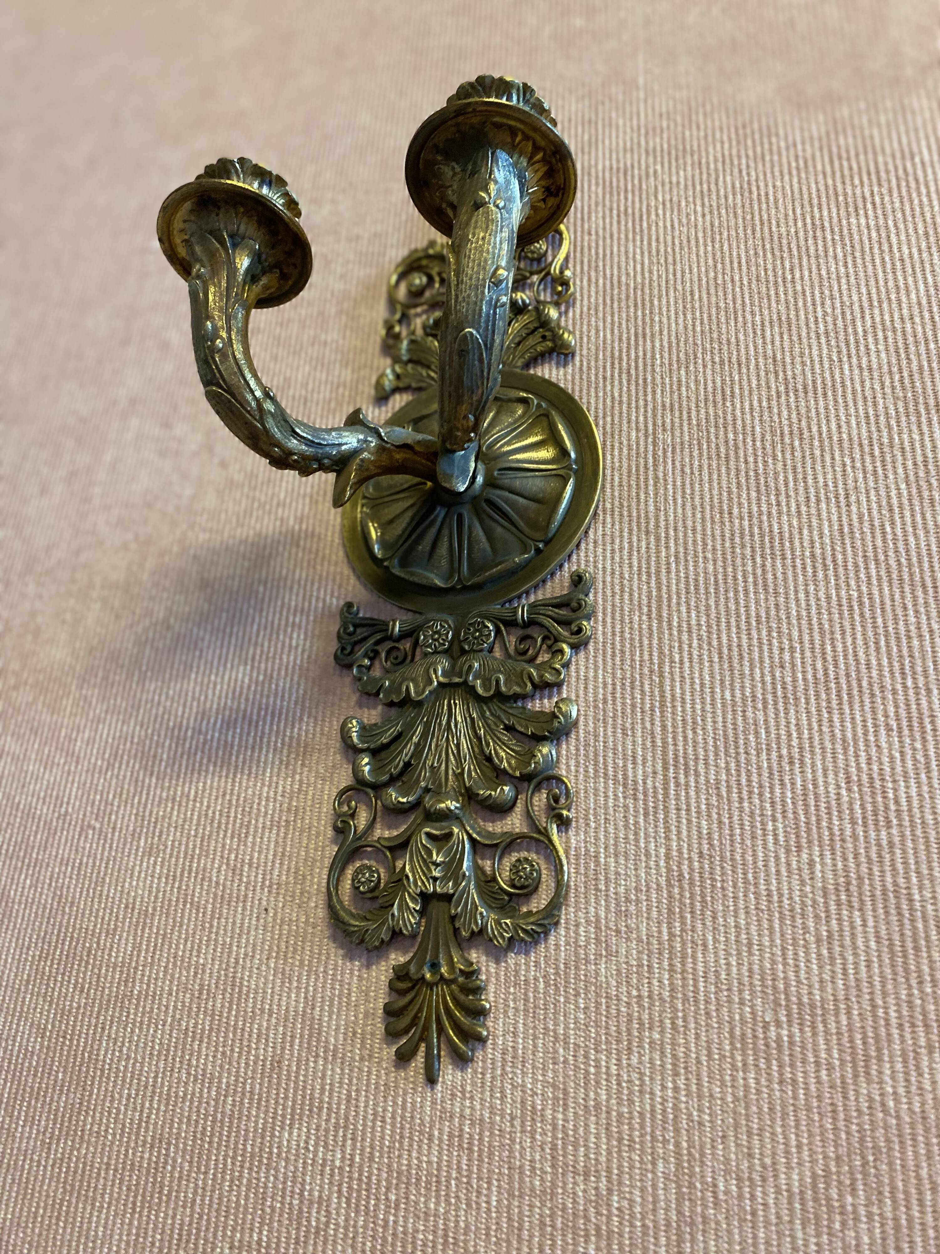 Pair of gilded bronze sconces, 2 burners, Restoration style.