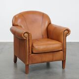 Cognac-colored cowhide leather armchair