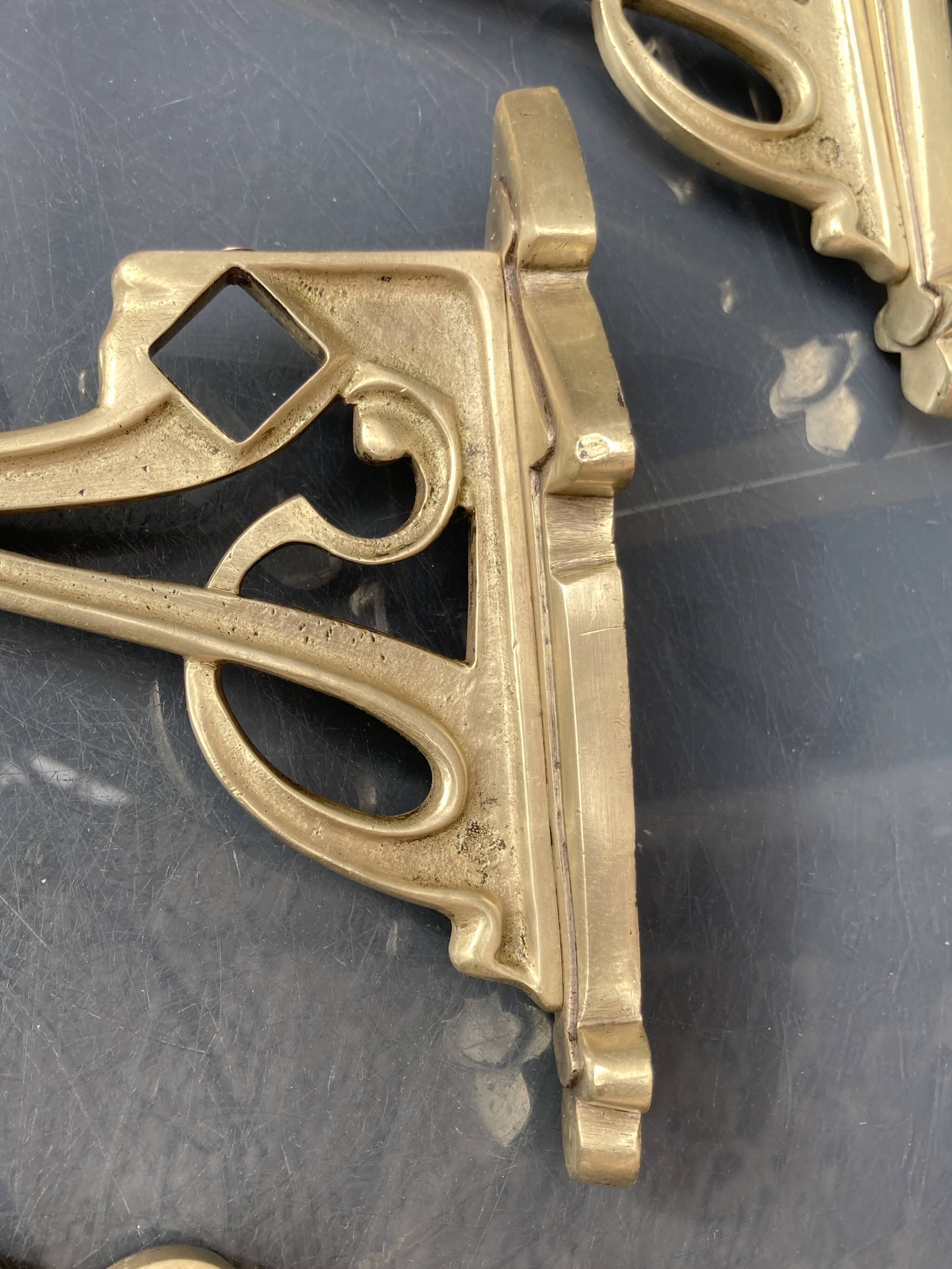 Art-deco wall-mounted coat rack in brass