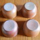 Lot of 4 bowls in sandstone and shiny grey inside