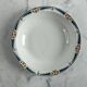 Longwy salad bowl with blue and orange floral decoration.