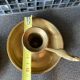 Two brass hand candle holders